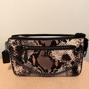 Coach Nolita 24 wristlet in embossed snakeskin